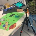 Stativ mit iPad und Landschaft als Hintergrund für Trickfilm